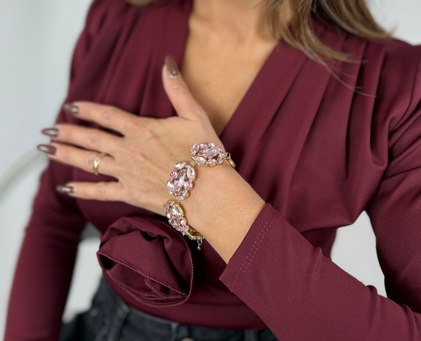 Bracciale con pietre e zirconi rosa