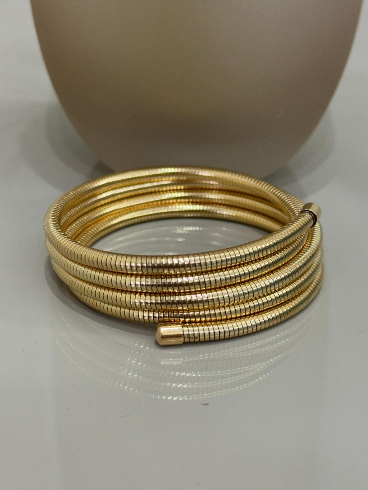Bracciale mod.molla stile tubogas in acciaio dorato