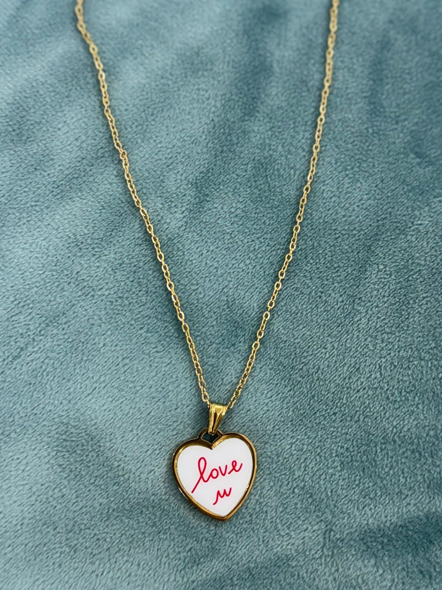 Collana Simbolika con ciondolo significativo base oro
