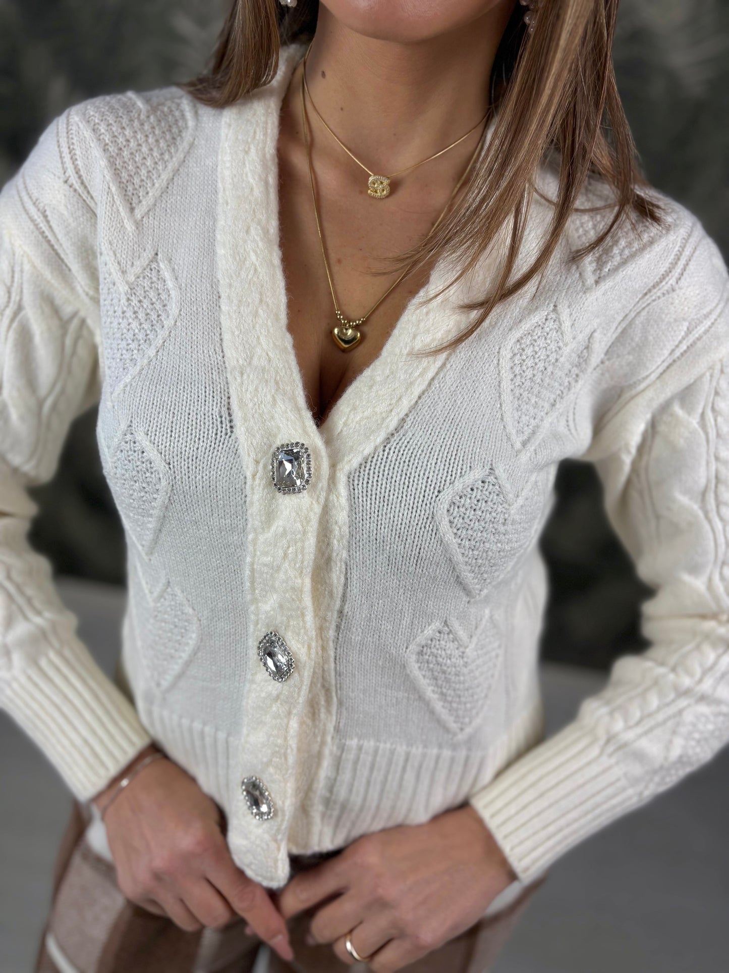 Cardigan con bottone diamante