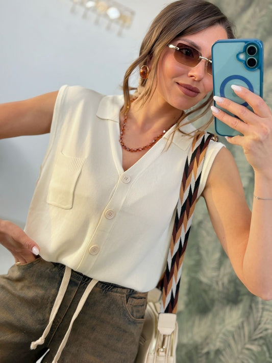 Pochette con una zip  e tracolla