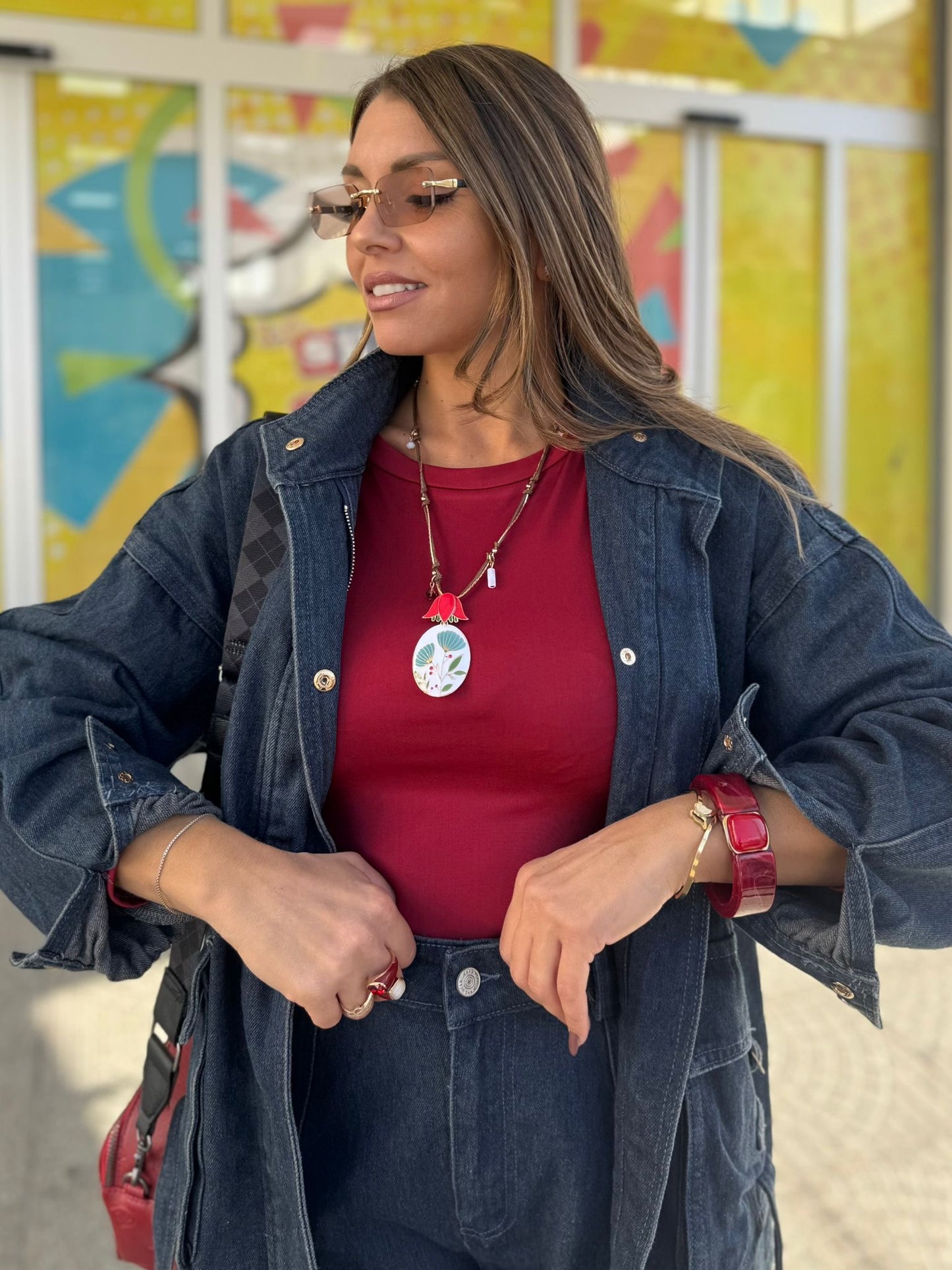 Collana con perline e ciondolo floreale