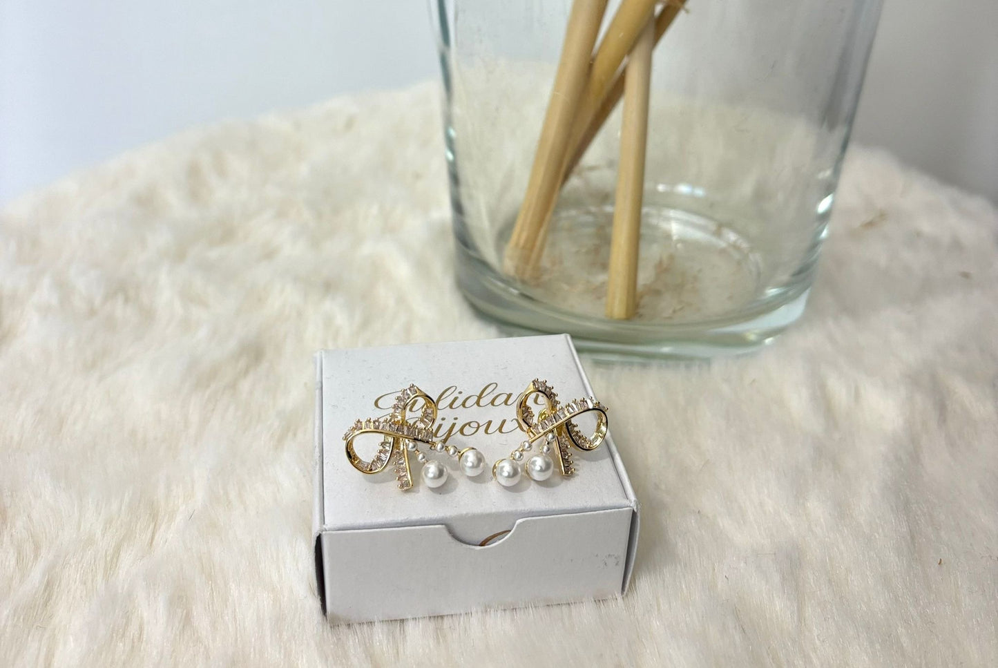 Orecchini fiocco con perline e strass