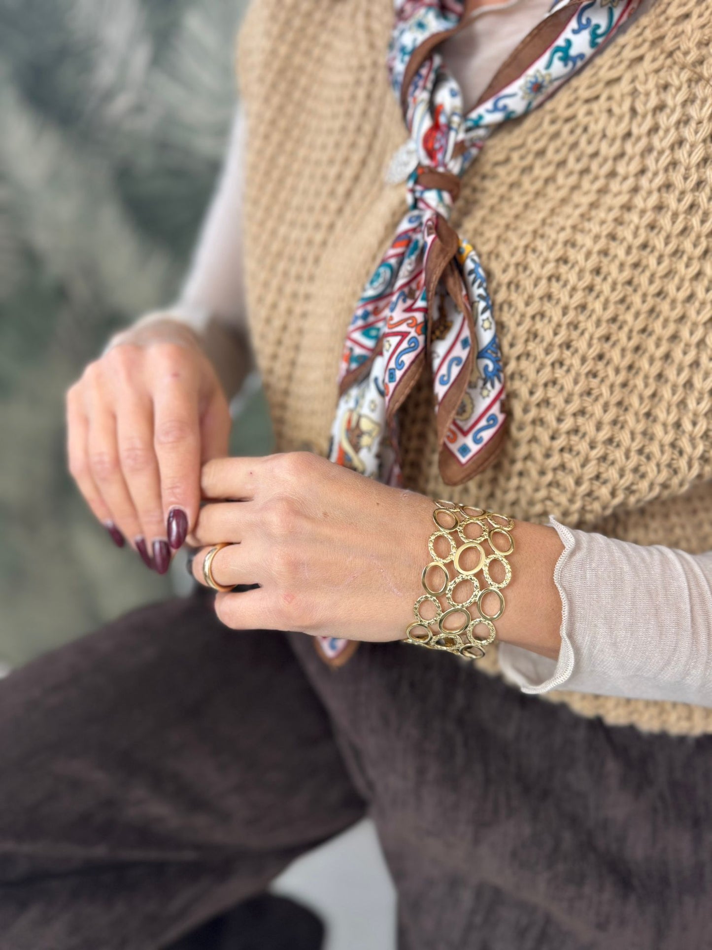 Bracciale fascia larga con design a maglie ovali interconnesse