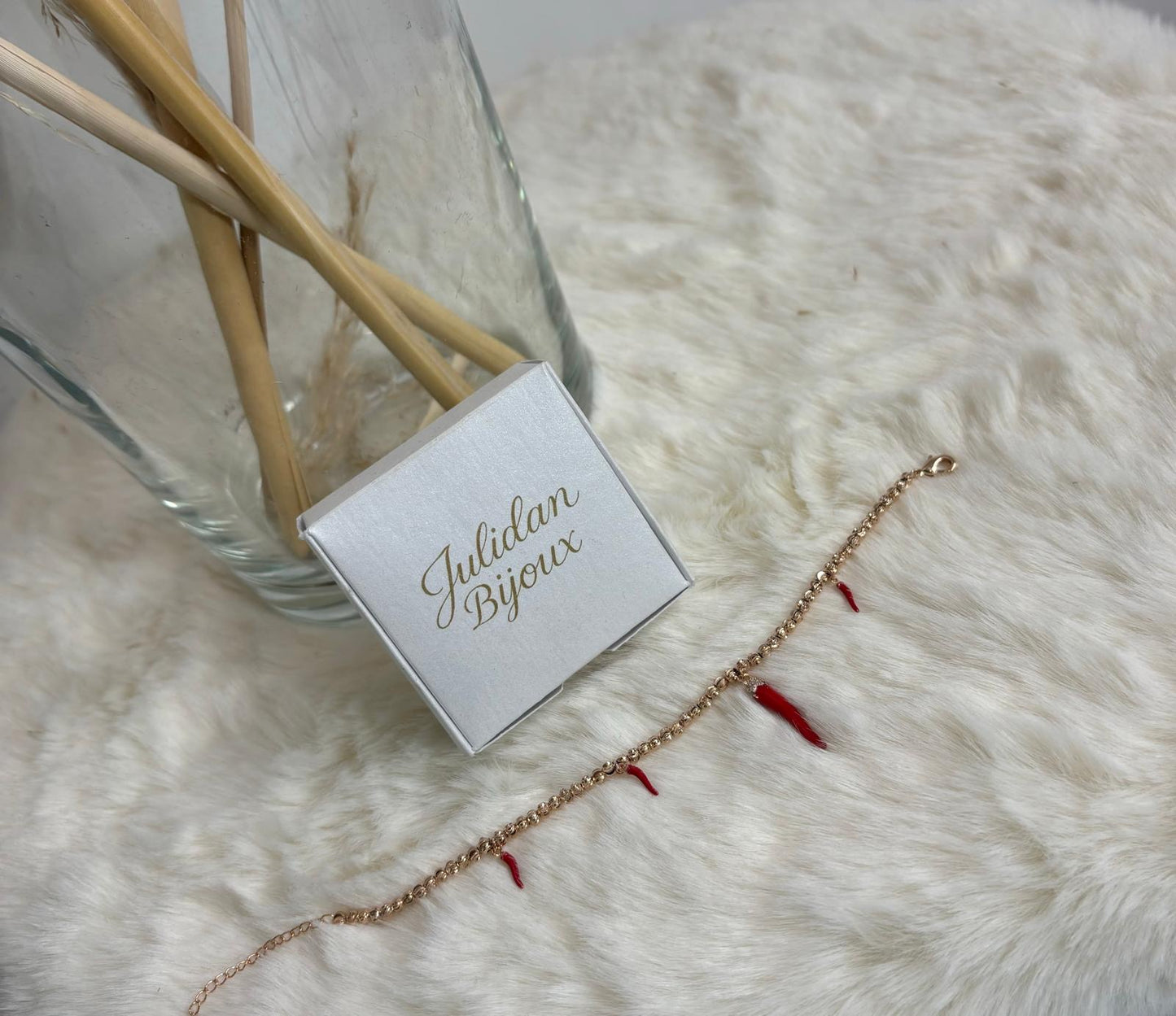 Bracciale corni rosso base oro