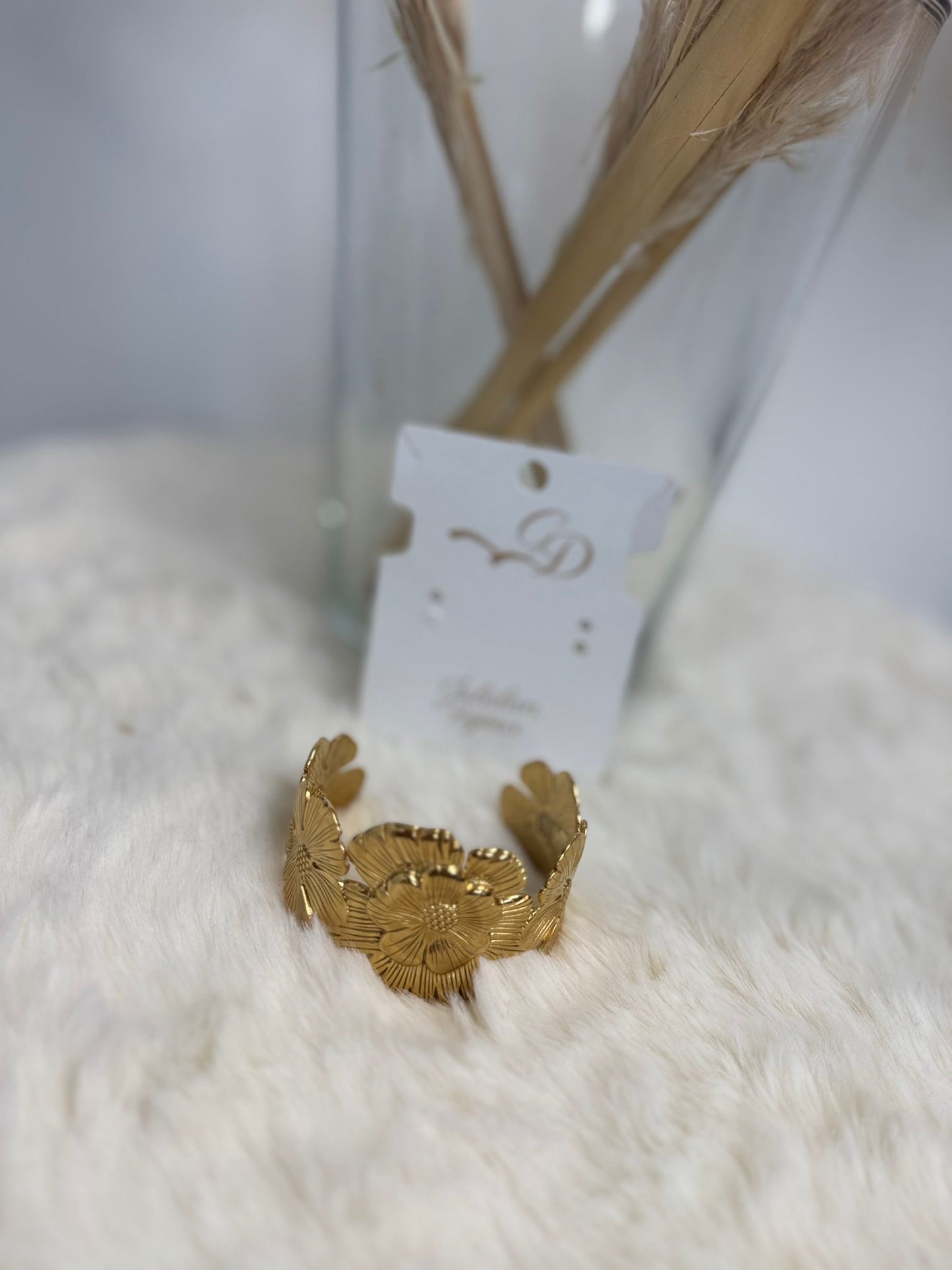 Bracciale fiore in metallo dorato