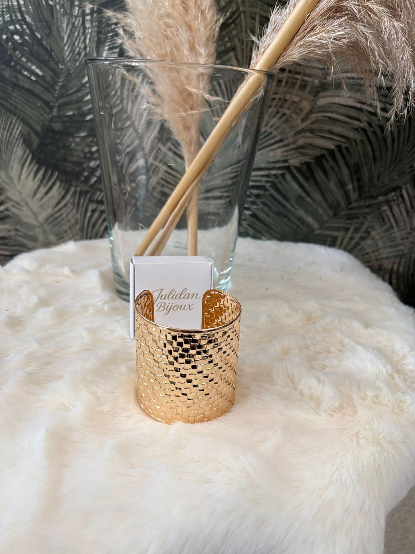 Bracciale a fascia dorata in texture intrecciata